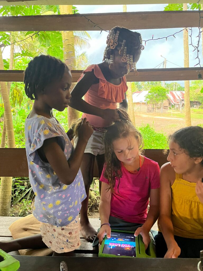 children Braiding Each Other's Hair