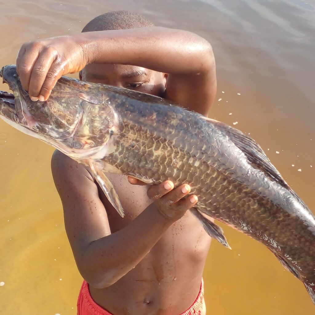 Boy with big fish